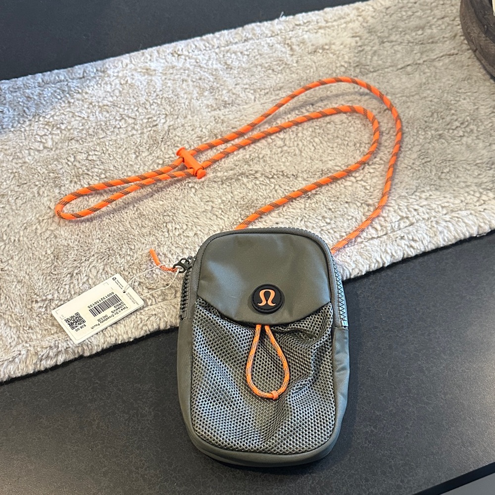 lululemon athletica crossbody bag in Green with Orange Accents